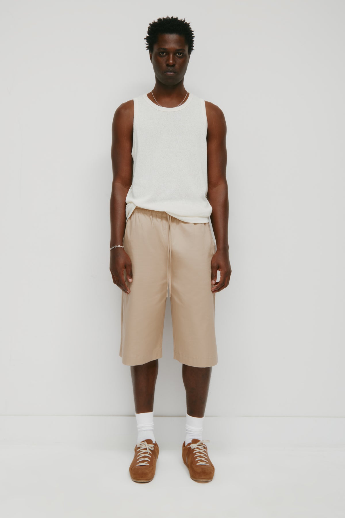 Model is 6'2" and is wearing a size L.