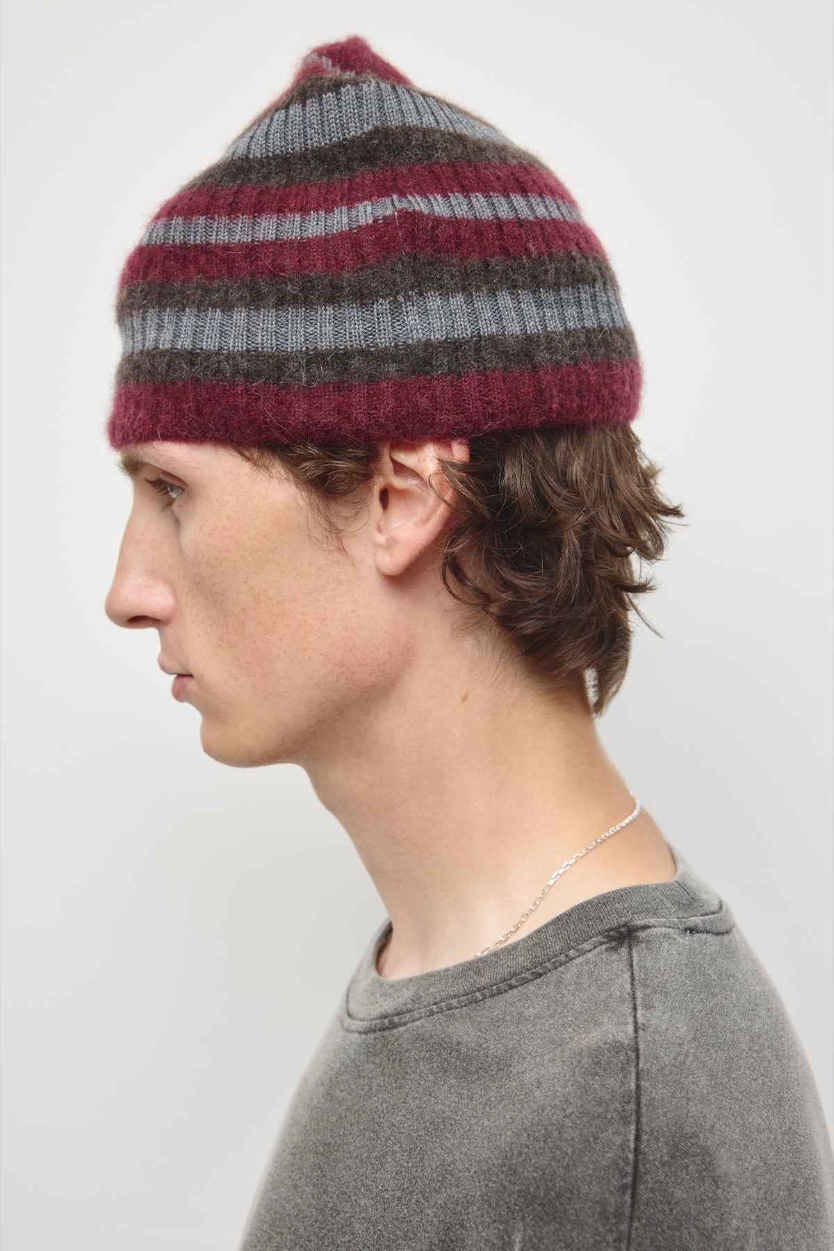 Sukun Fuzzy Beanie in Tawny Port/Charcoal/Graphite