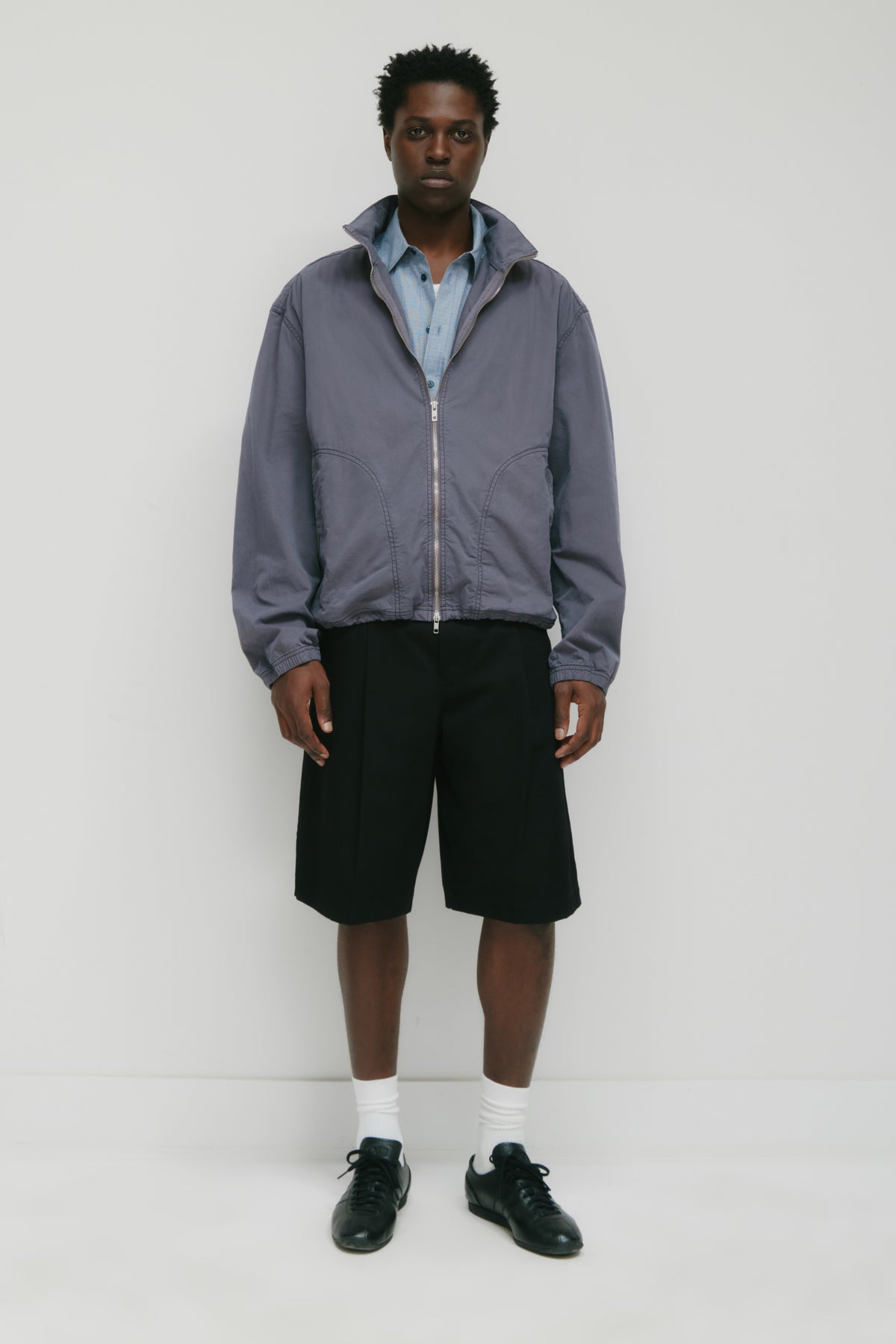 Model 6.2" and is wearing a size L.
