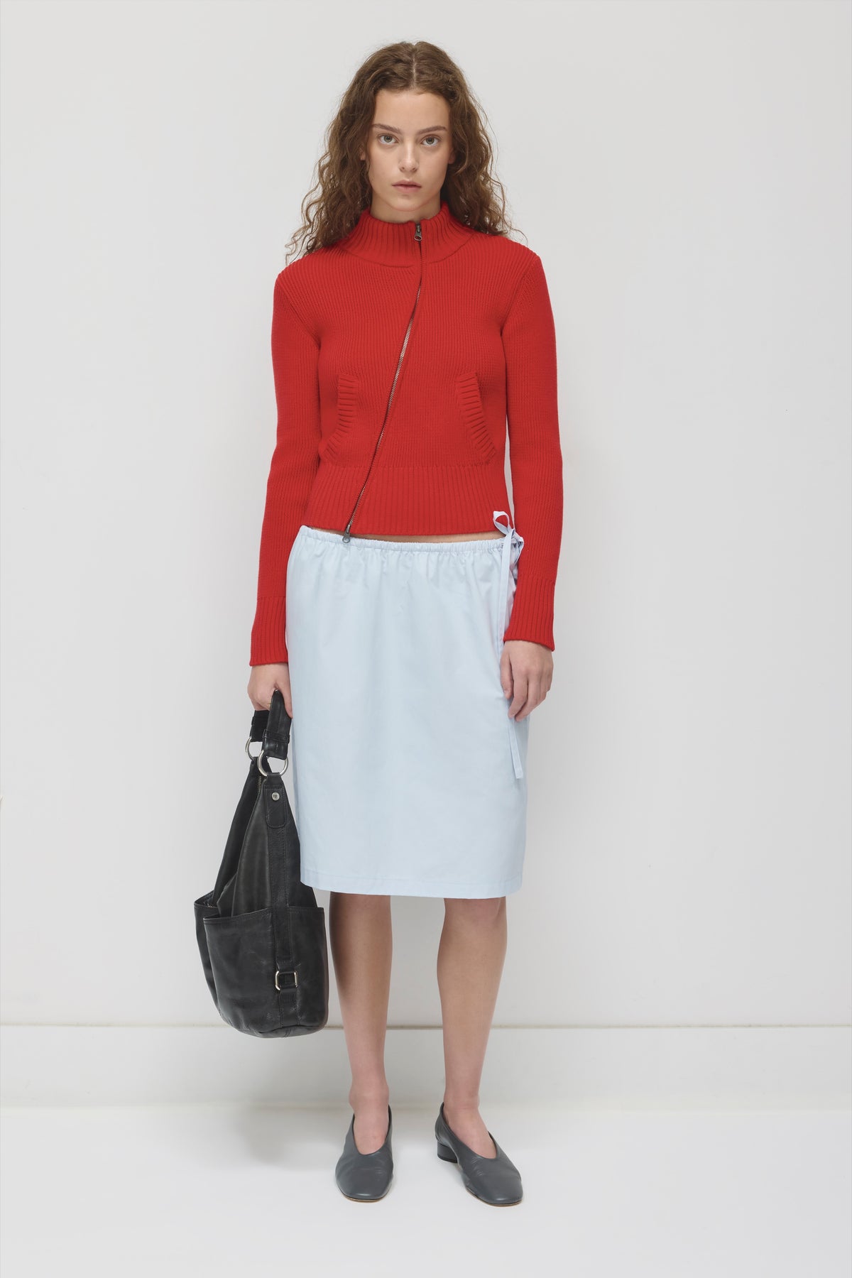 Model is 5’9” and is wearing a size XS.