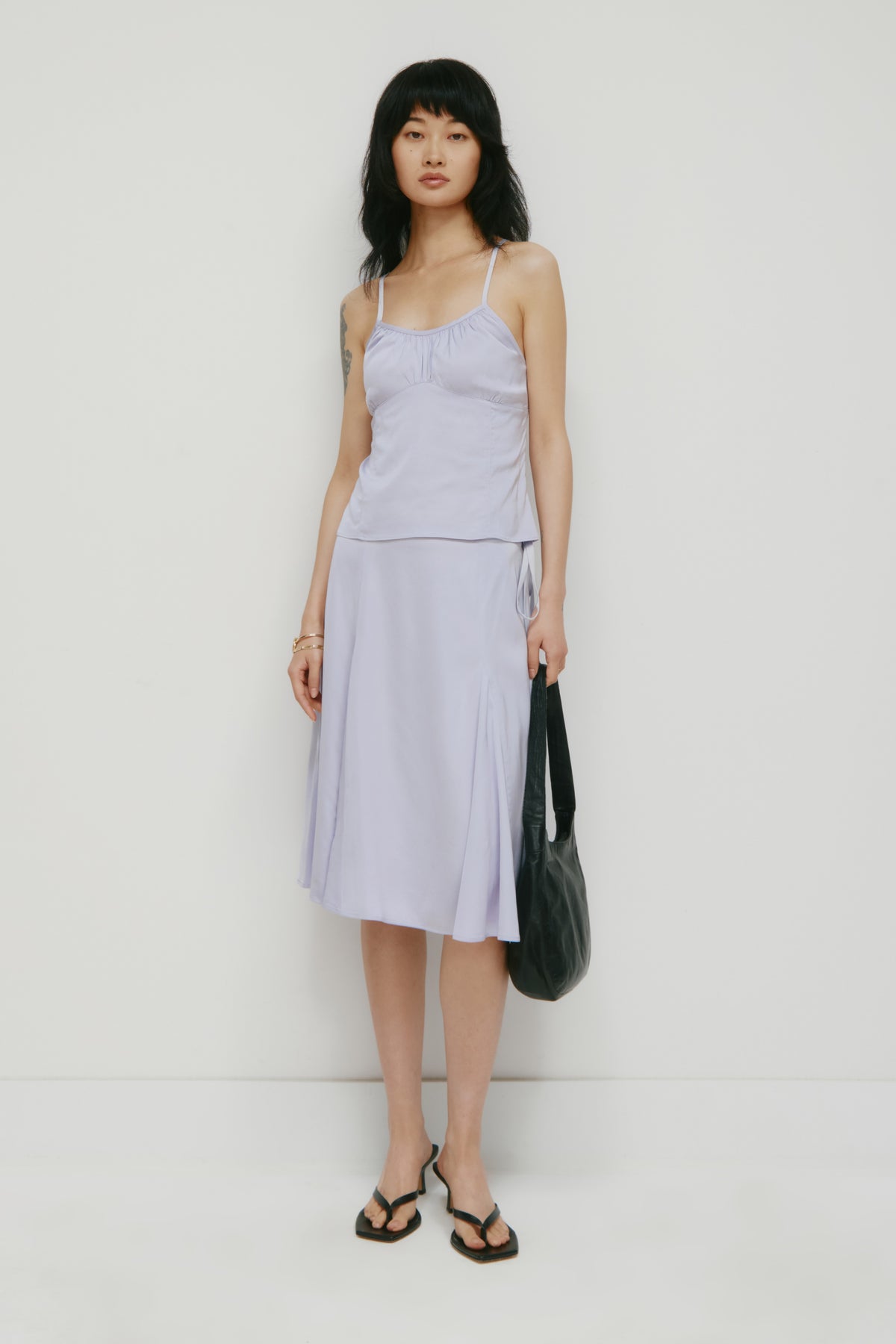 Model is 5’9” and is wearing a size 4.