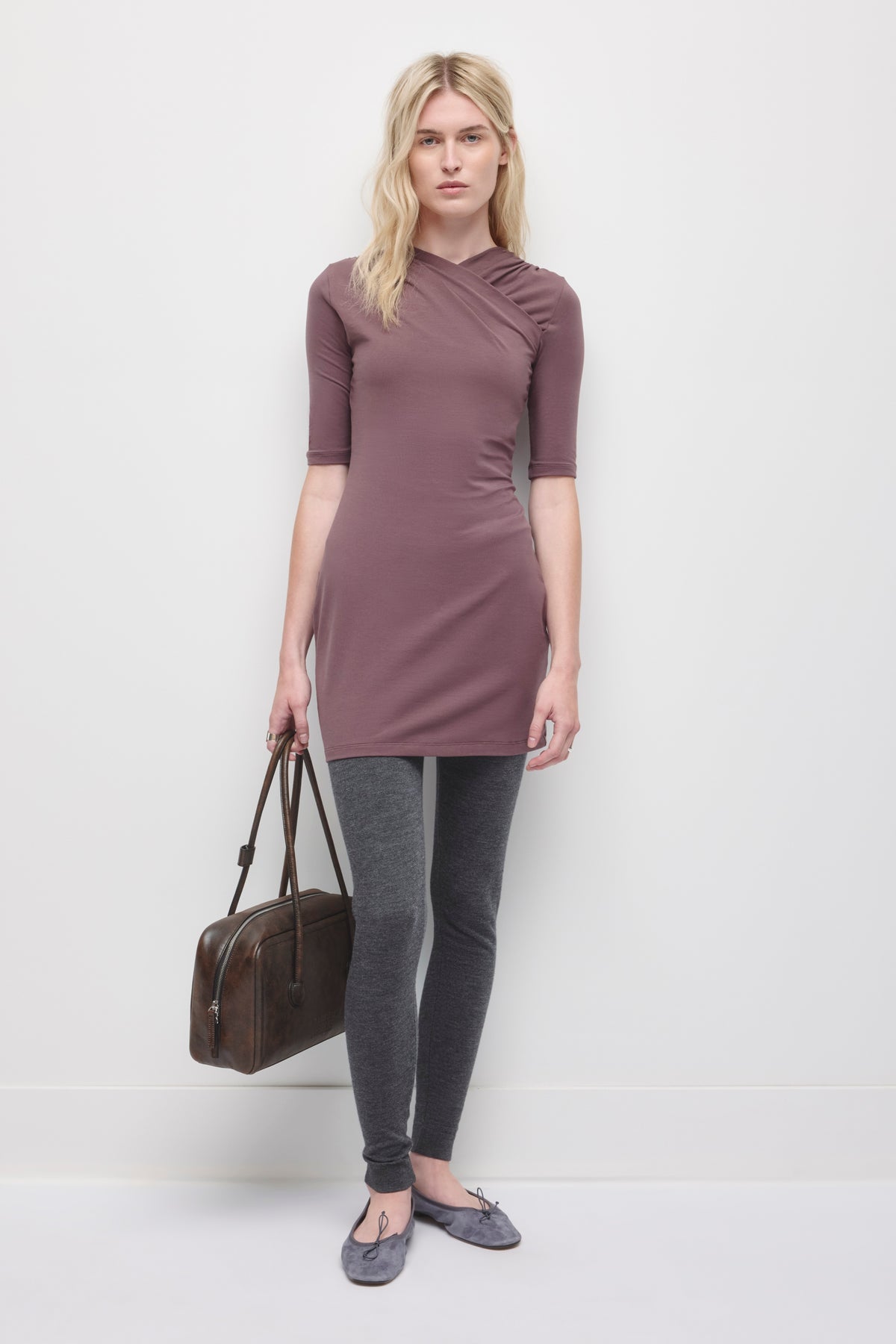 Model is 5'10" and wearing a size XS.
