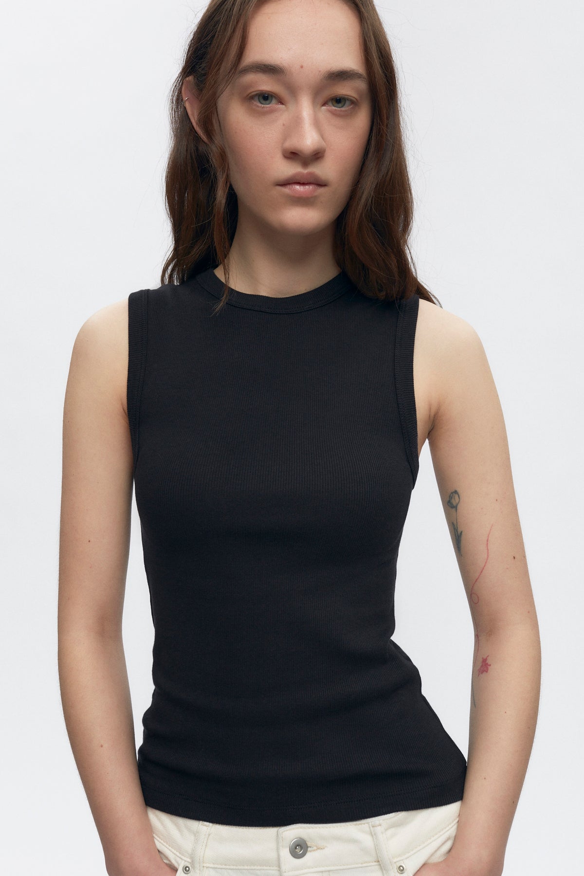 Elizabeth is 5’11" is a regular XS and is wearing an S.