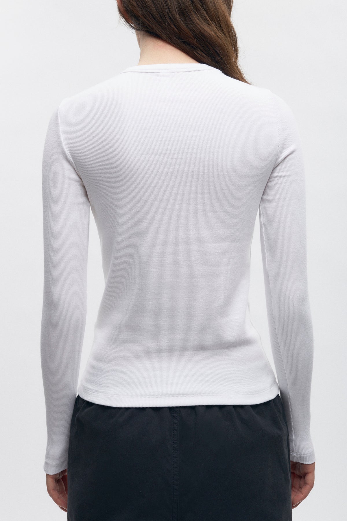 Manches longues ajustées en côtes pour femmes en blanc