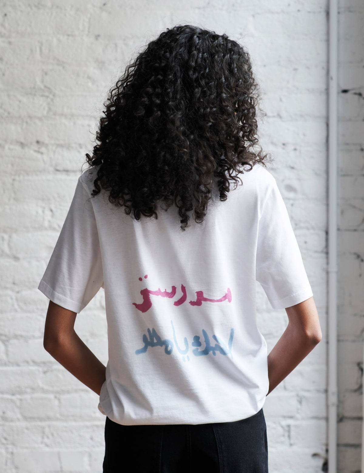 Maya wears the Kotn x KWW Little Flowers Essential Crew in White